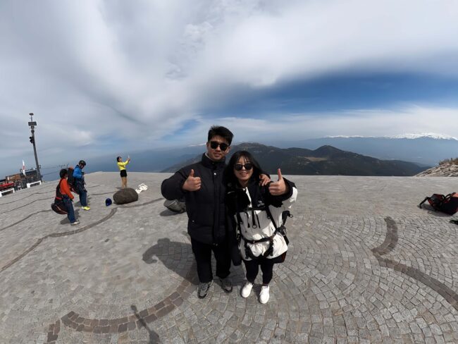 Passengers during a paragliding takeoff from Babadağ over Ölüdeniz